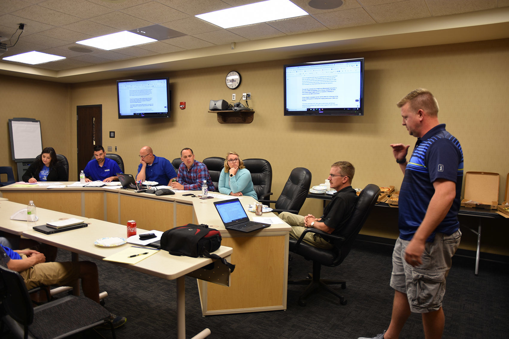 Ackerman presents at school board